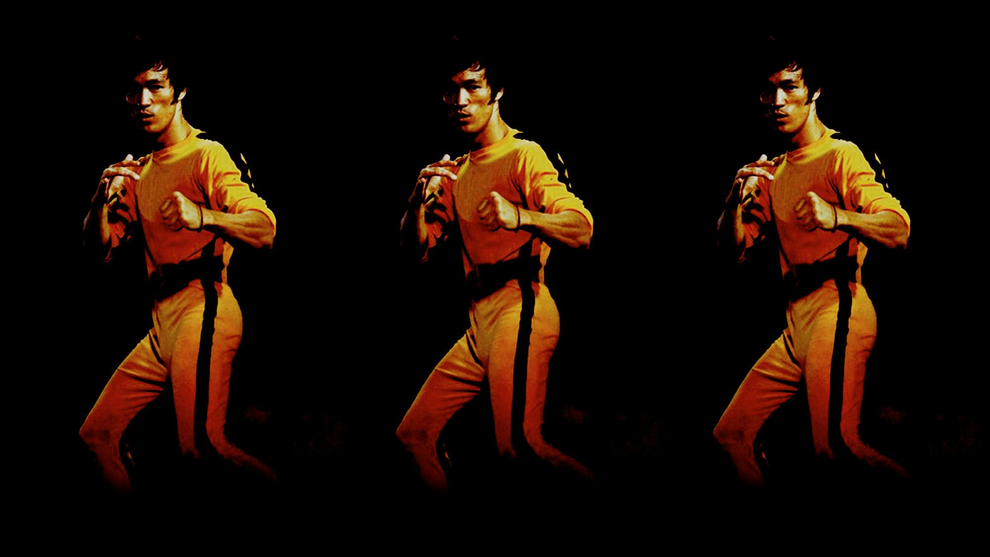 Bruce Lee in iconic yellow jumpsuit