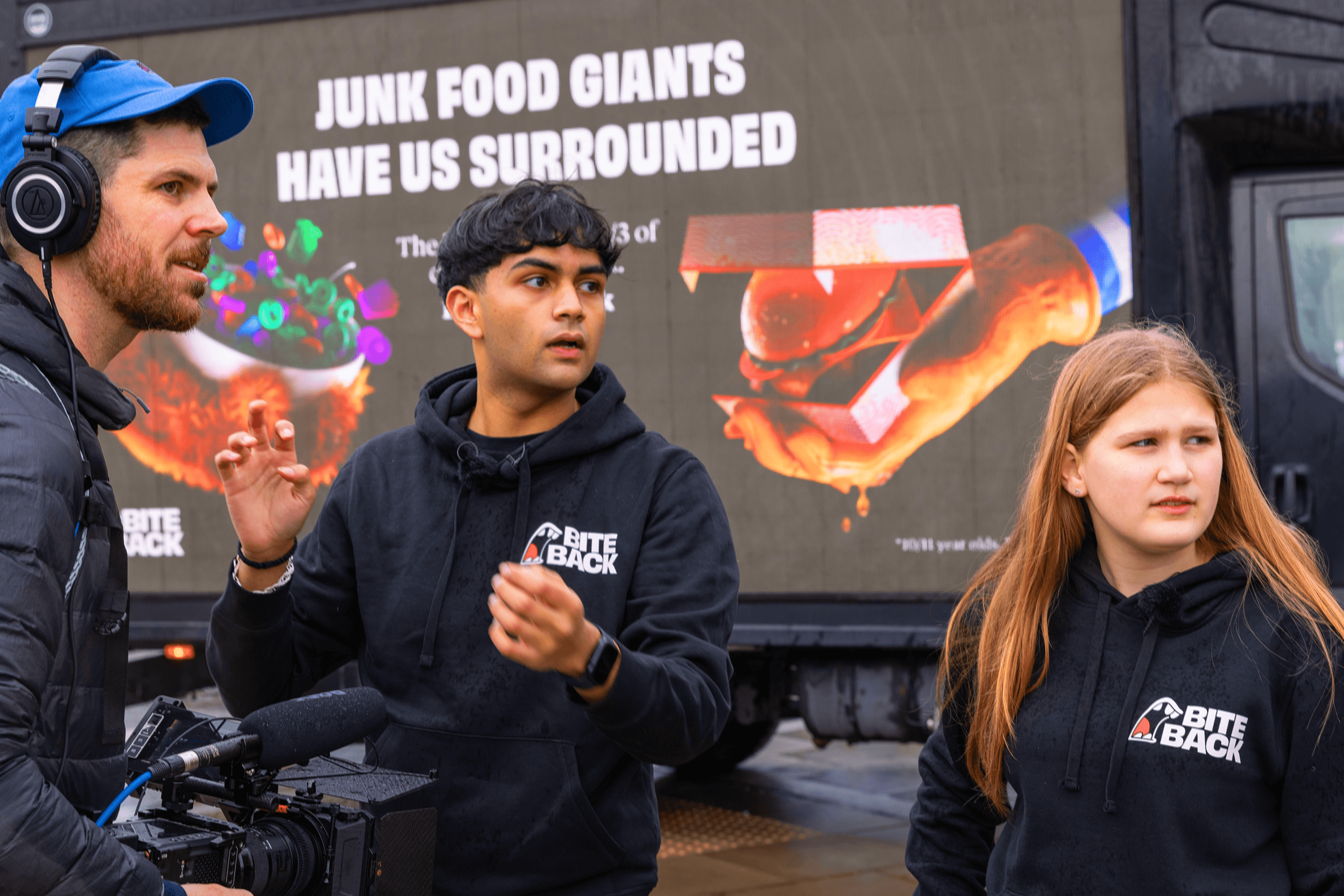 Bite Back Activists standing in front of a branded truck